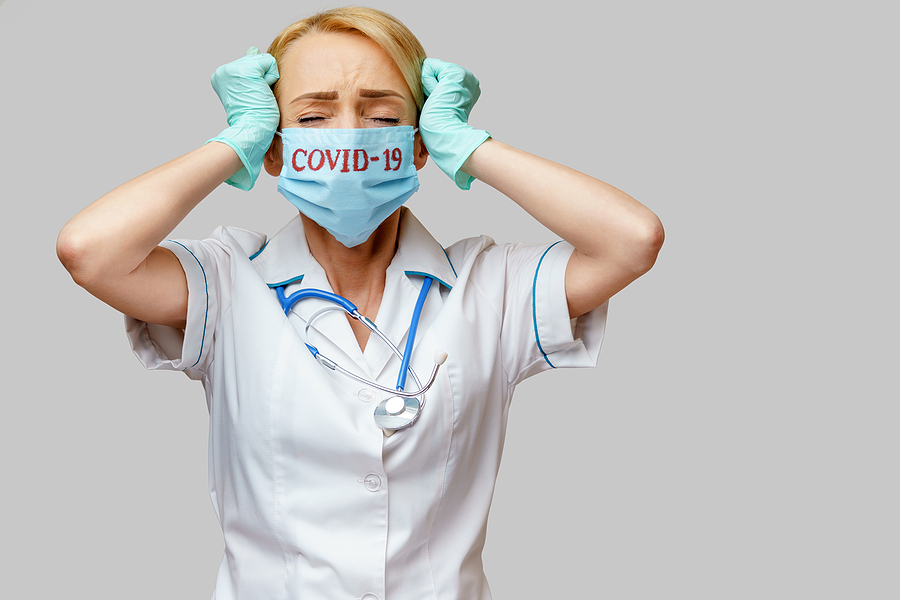 Medical Doctor Nurse Woman Wearing Protective Mask And Rubber Or